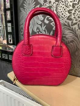 New Product….small fushia pink rounded mock crocodile print handbag