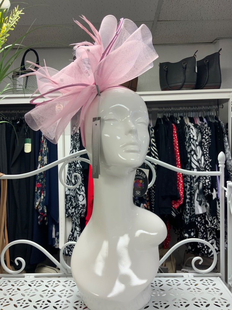 Pink fascinator on headband
