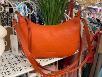 New Product….orange cross the body bag with tassel trim