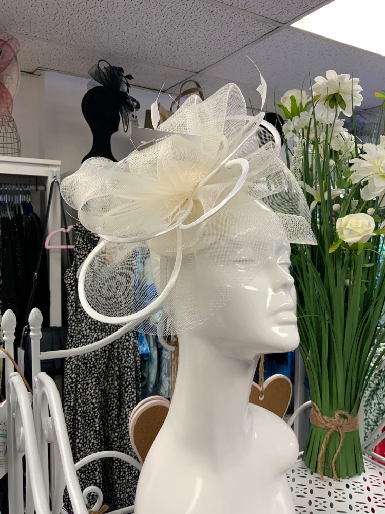 New Product….cream fascinator on headband with feather netting and satin tr