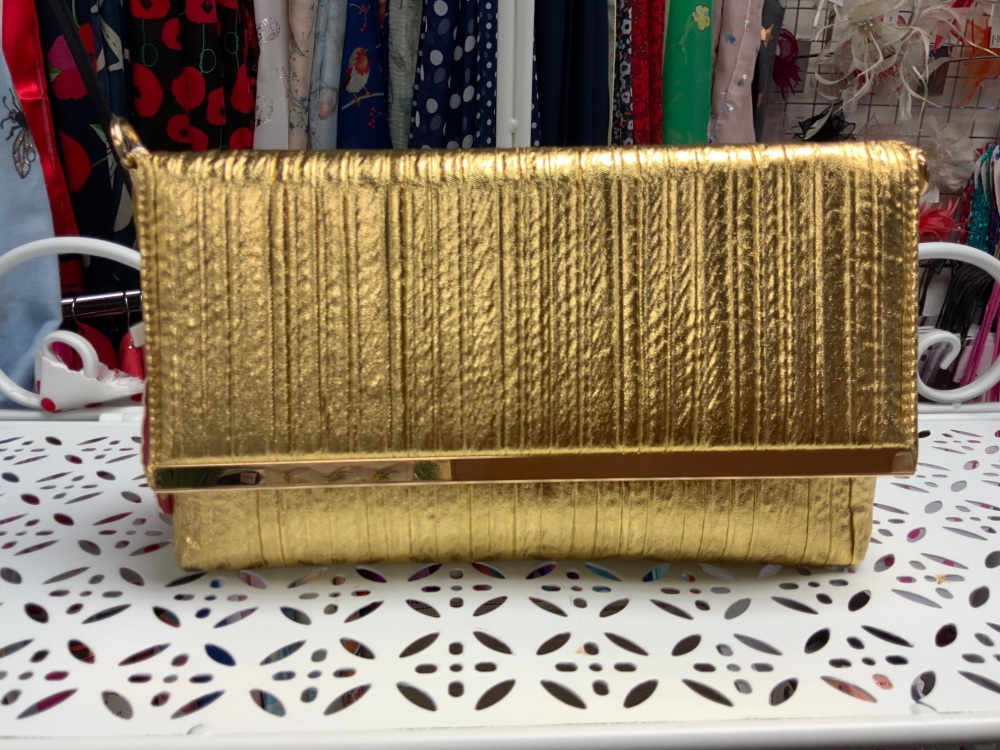 New Product….gold clutch bag with long gold chain….25 x 15 cms approx