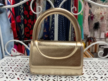 New Product….gold bag with handle and long gold chain….18 x 12 cms without handle