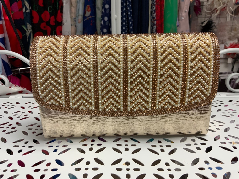 New Product….gold clutch trimmed with pearls and gold beads