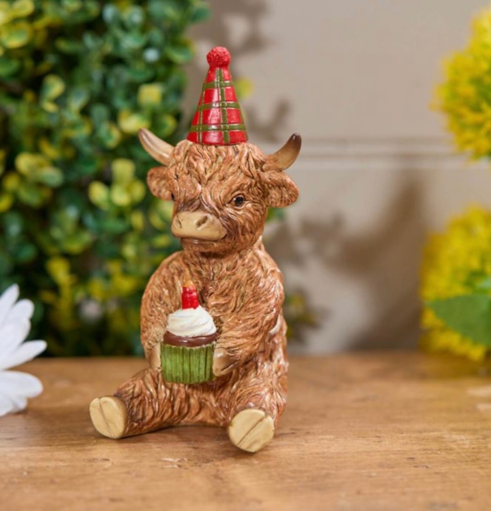 New Product….resin highland cow with party hat and cupcake