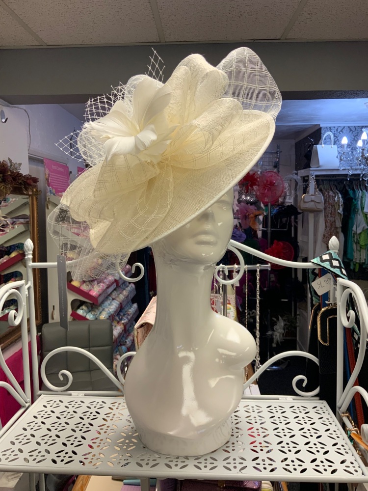 New Product….large cream fascinator on headband with netting and flower tri