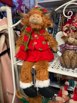 New Product….girl highland cow plush dressed shelf sitter with red and green scarf