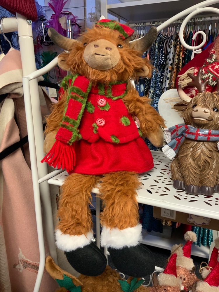 New Product….girl highland cow plush dressed shelf sitter with red and gree