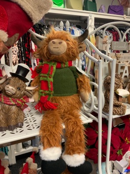 New Product….boy highland cow plush dressedshelf sitter with red and green scarf