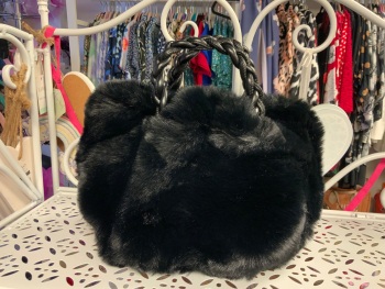 New Product….small faux fur black handbag….stud fastener