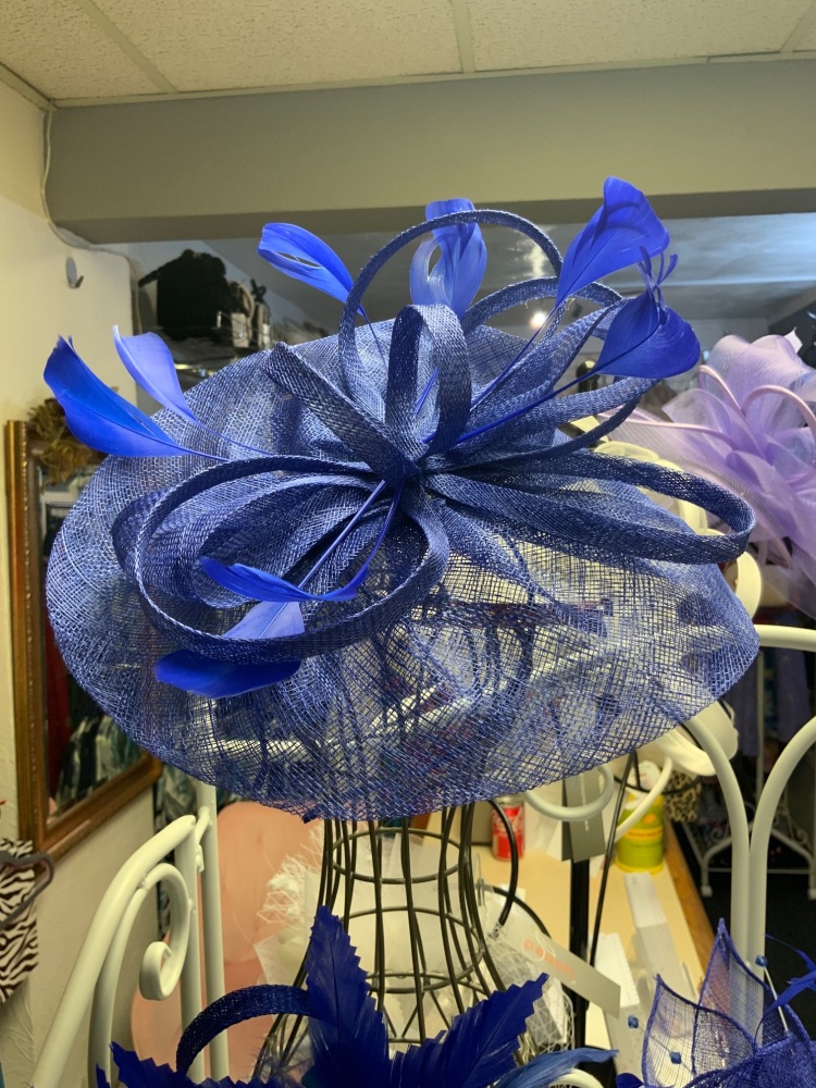 New Product….cobalt blue fascinator on a thin headband….sinamay and feather
