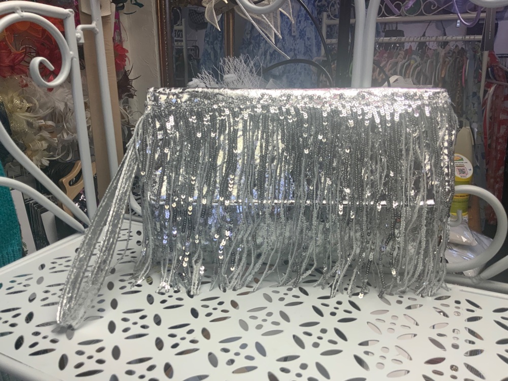 New Product….silver fringed clutch bag with wrist strap