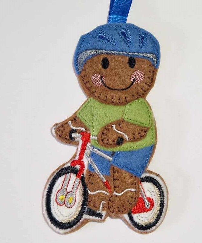 Cyclist  on bike Gingerbread Felt Hanging Decoration, Christmas Tree Decoration. Available as Keyring & Fridge Magnet too.