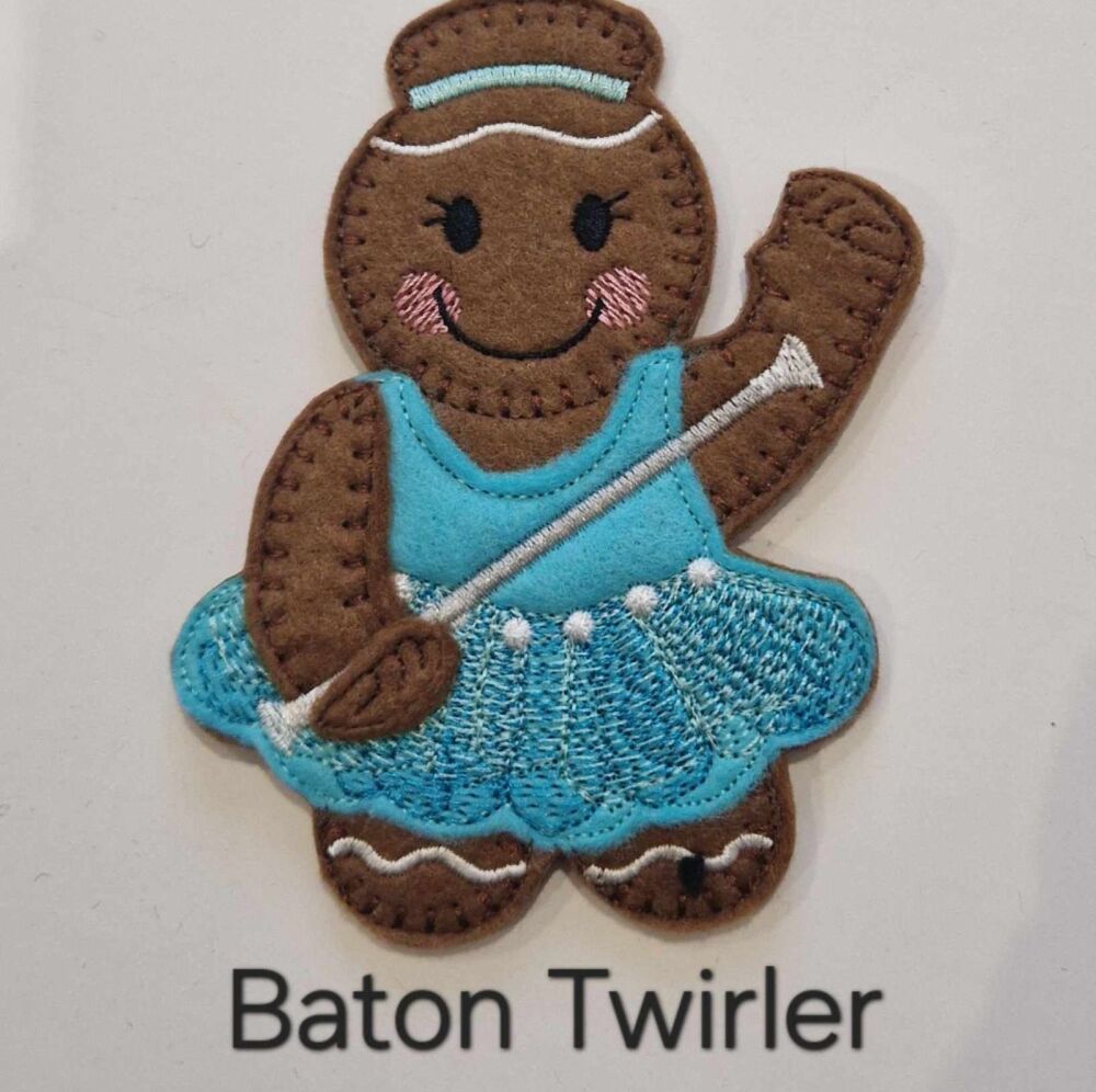 Baton Twirler Gingerbread Decoration. Available as a Hanging decoration, Keyring/Bag charm Or fridge magnet