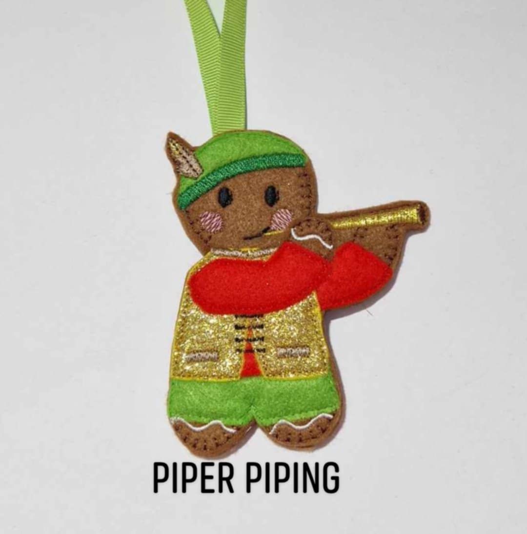 Piper Piping Gingerbread Felt Hanging Decoration, Christmas Tree Decoration. Available as Keyring & Fridge Magnet too. Part of 12 days of Christmas