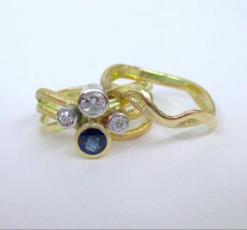 Sapphire Squiggle Engagement Ring With Matching Wedding Ring