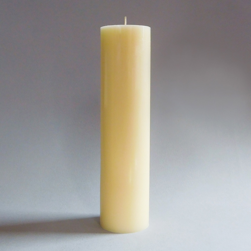 Large ivory beeswax pillar candles