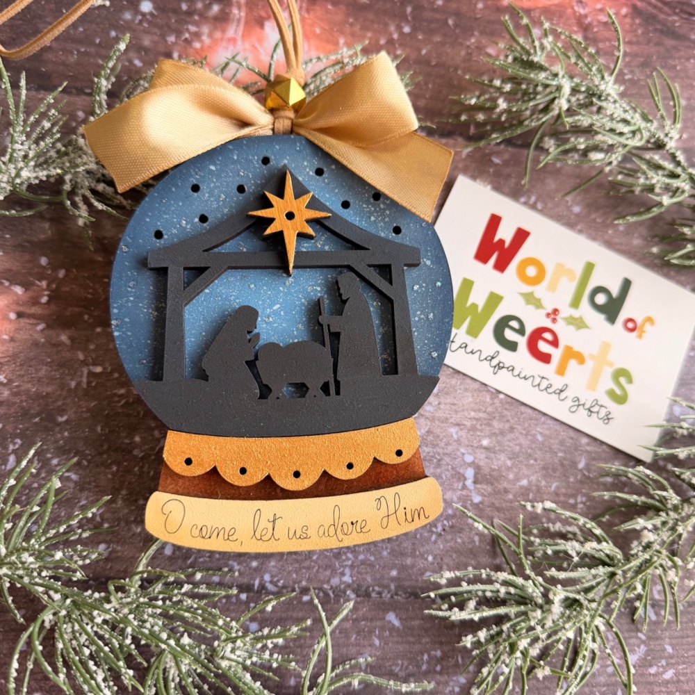 Nativity snow globe light-up ornament