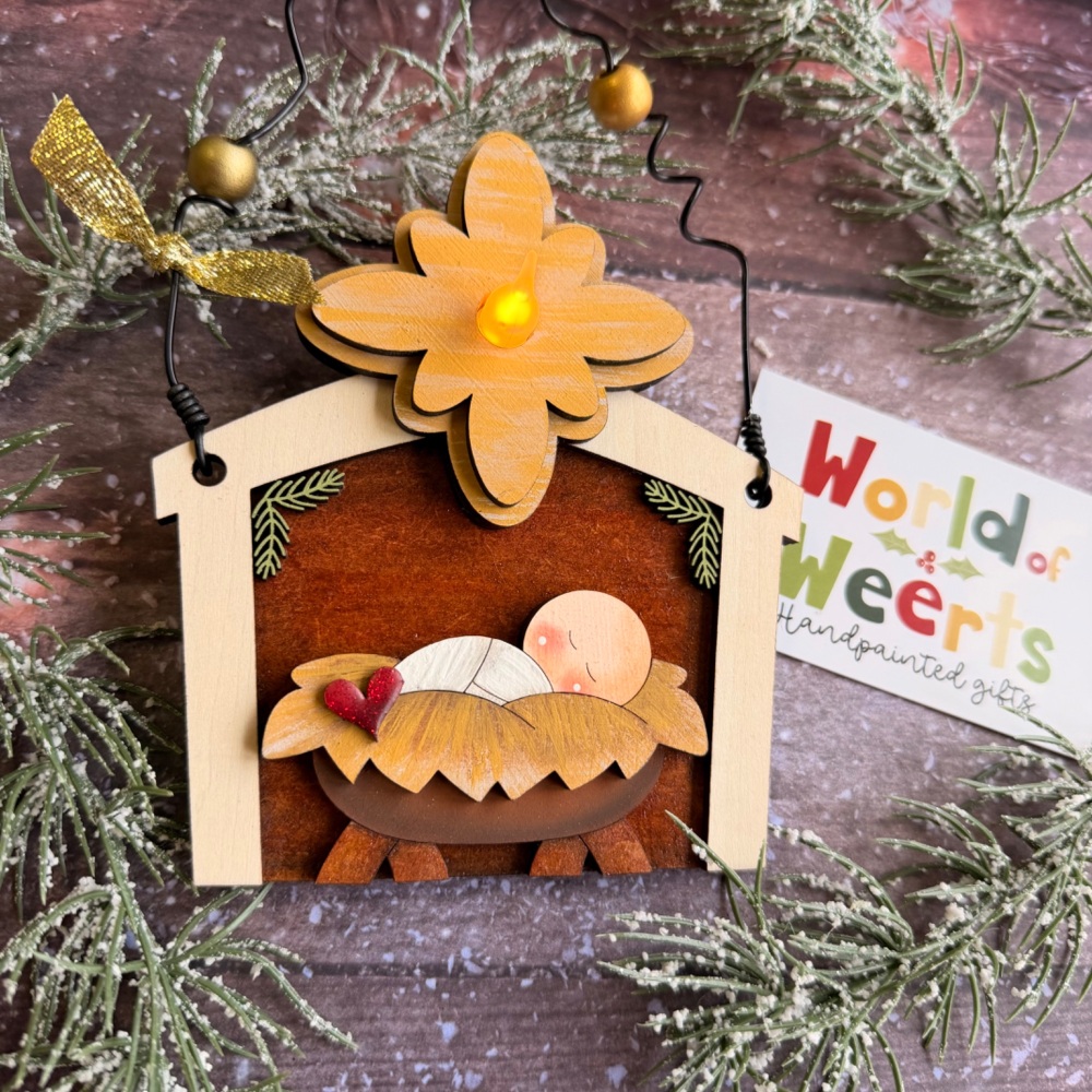 Light-up Nativity manger ornament.
