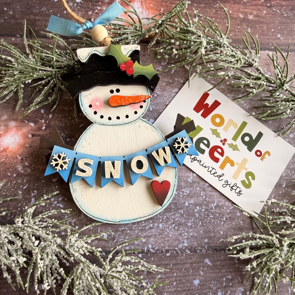 Snowman with flag banner.