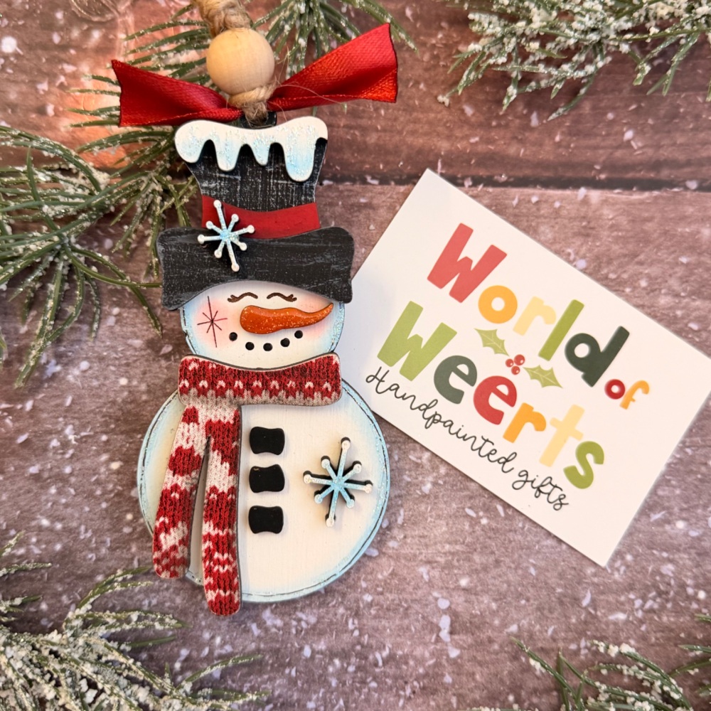 Large snowman with realistic scarf