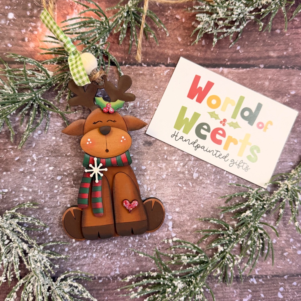 Reindeer hanger with red and green scarf.