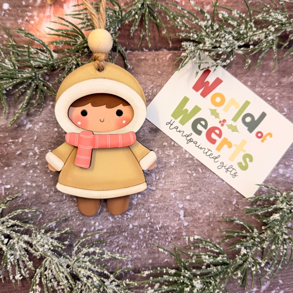 Snowkid. Brown hair, pink scarf