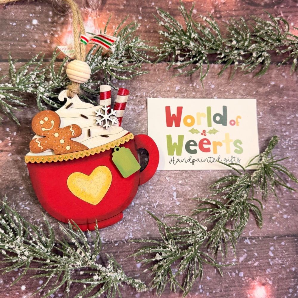 Cup of cheer with a gingerbread cookie