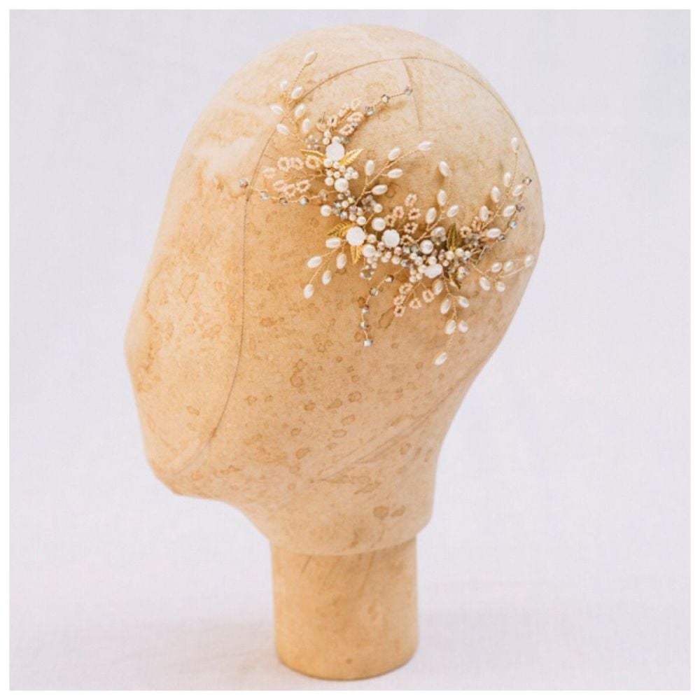 Tiny rose and leaf gold headpiece on mannequin