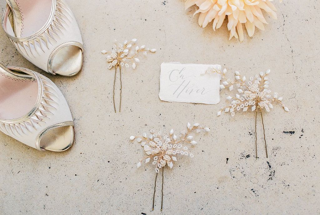 Delicate beaded bridal hair pins handmade by Clare Lloyd and a pair of Emmy London Shoes