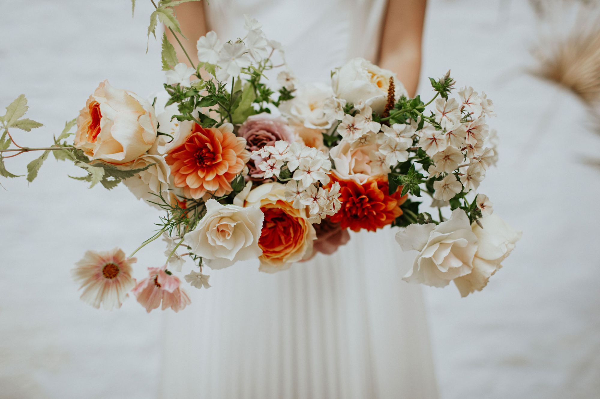 coral and ivory bridal bouquet by Clementine Moon Florist in Bristol 