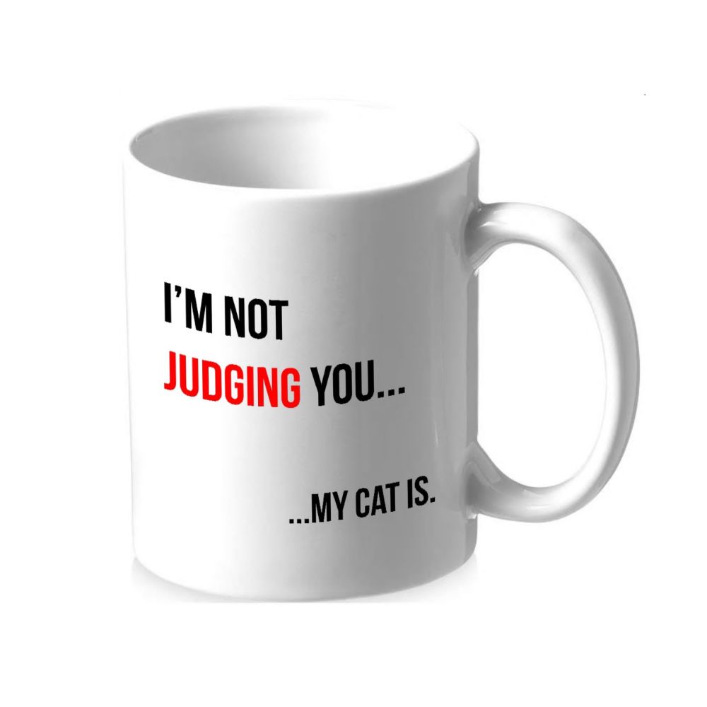 I'm Not Judging You.....My Cat Is. Coffee Mug