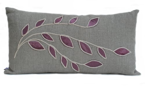 linen cushion with plum leaf design