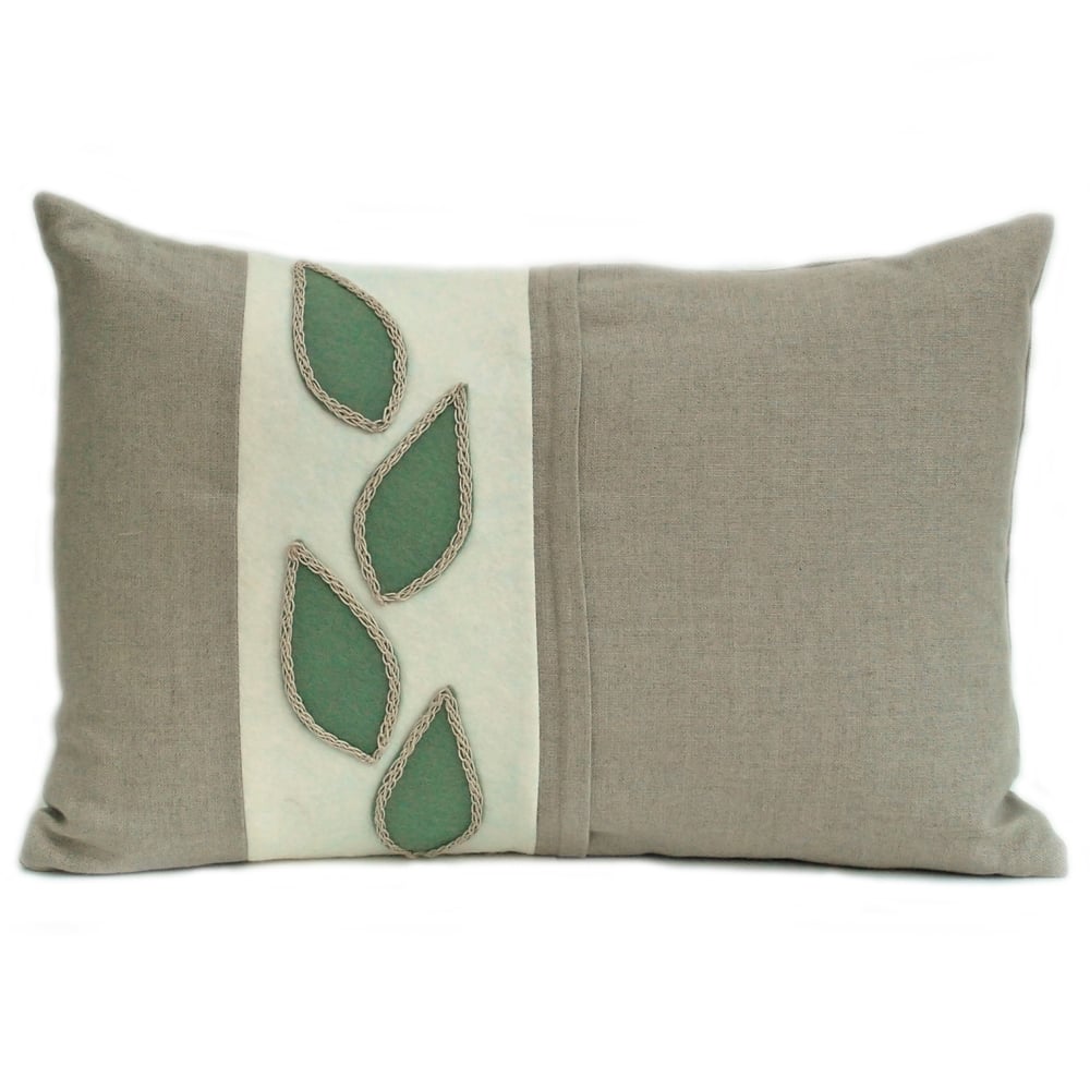 Linen and wool felt cushion with natural leaf design