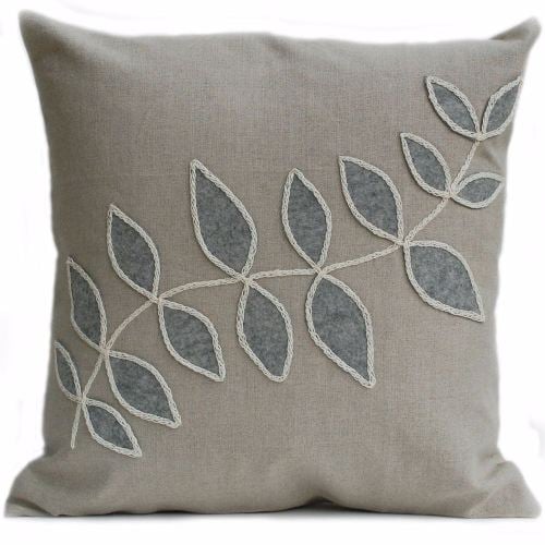 Linen cushion with grey leaf design