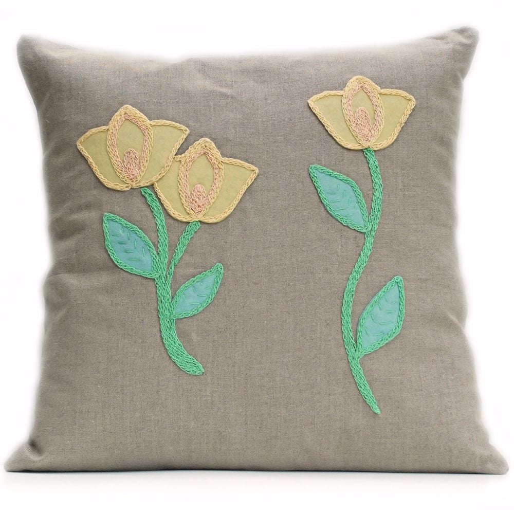 Linen cushion with wool felt and crocheted tulips 