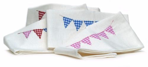 White napkins with appliqued bunting design