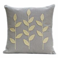 Linen cushion with wool felt primrose leaves 