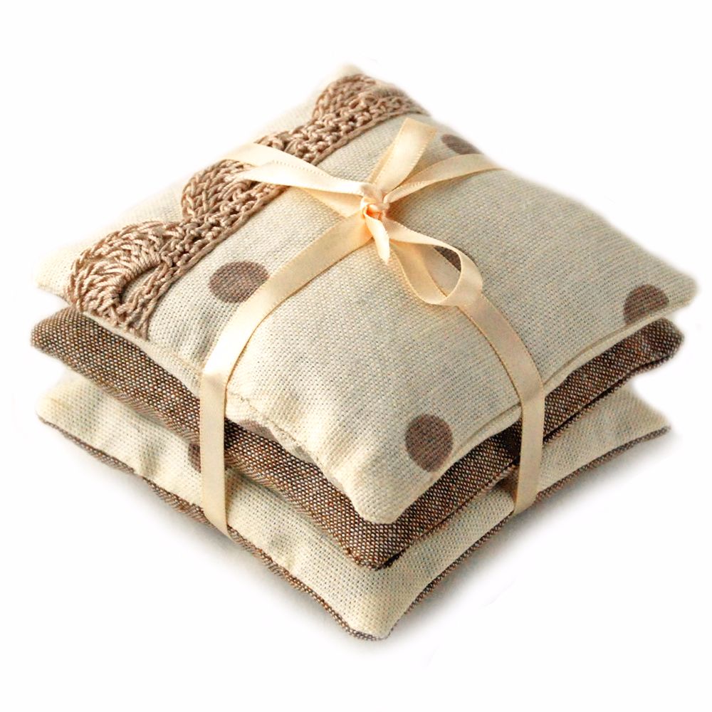 Lavender pillows in cream and taupe spots design