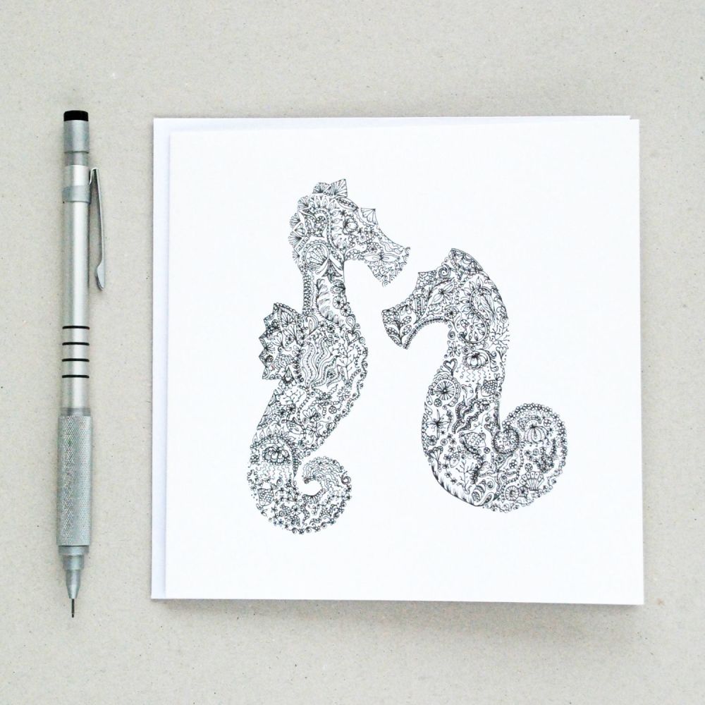 Floral seahorses design greetings card