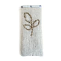 Linen specs pouch with crocheted leaf detail