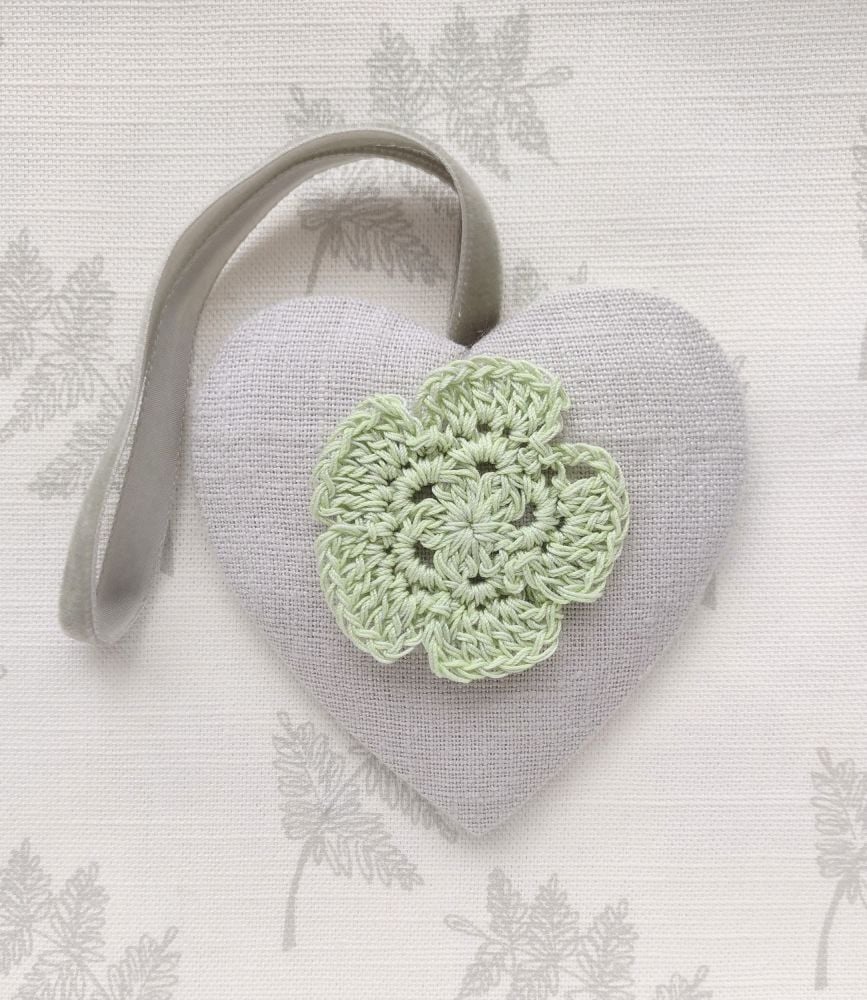 Hanging heart in cloud linen with green crocheted flower