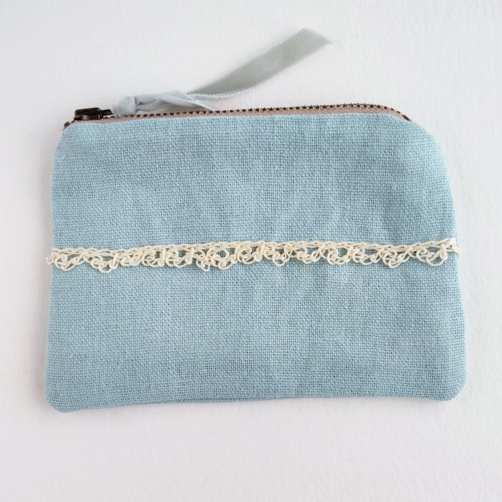 Linen coin purse in duck egg blue with a natural hand crocheted