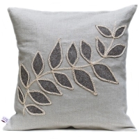 Linen cushion with leaf design
