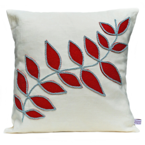 Linen cushion with cream leaf design