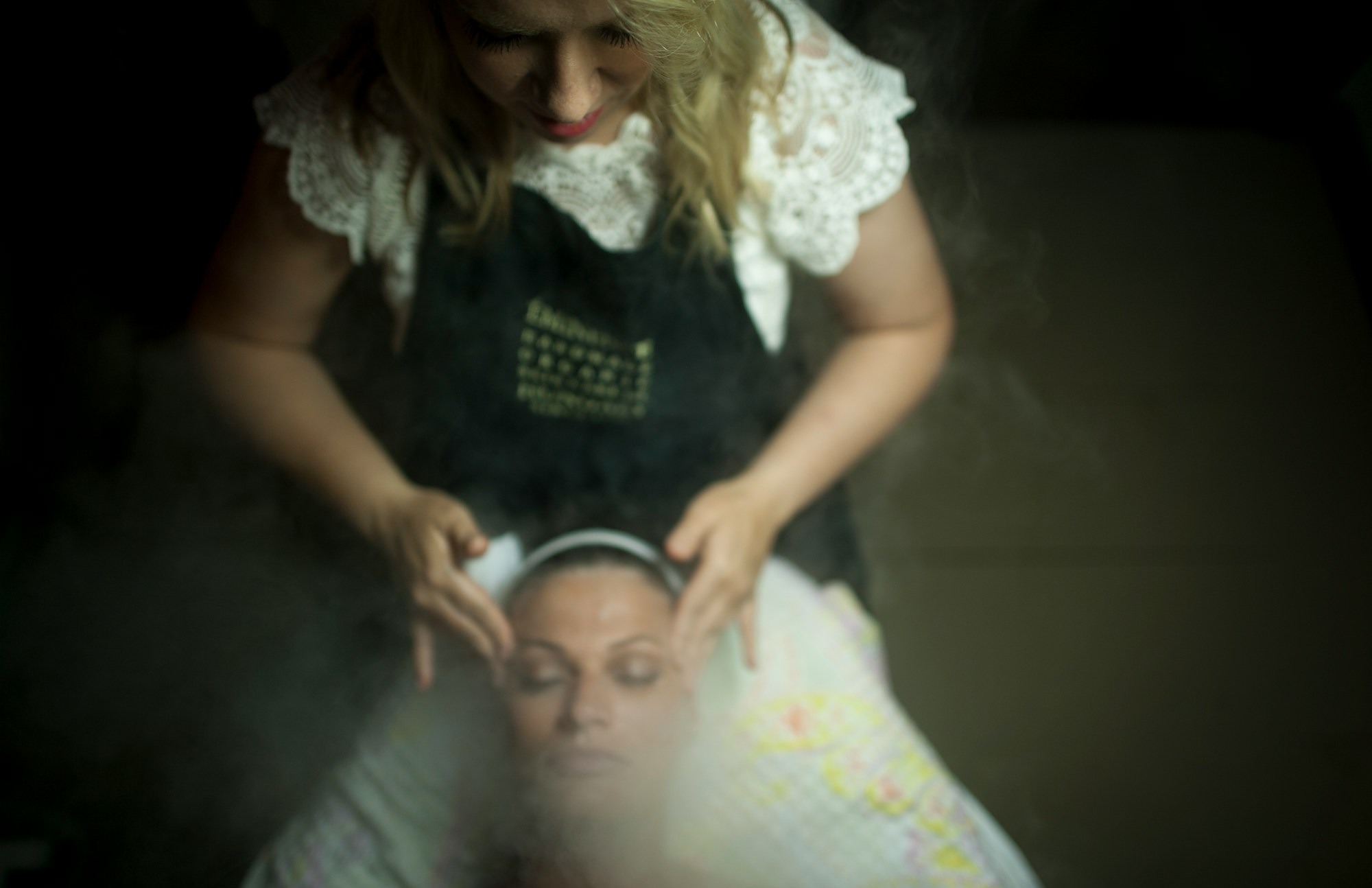 woman-in-black-and-white-shirt-carrying-baby-dpXBsRxAVHM