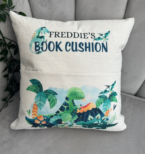 personalised dinosaur book cushion