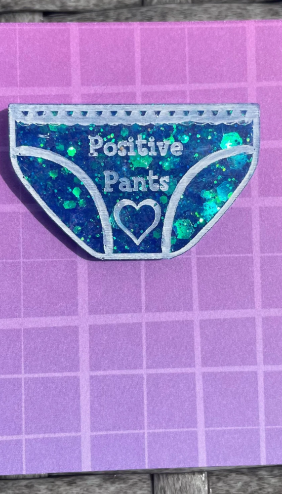 positive pants brooch