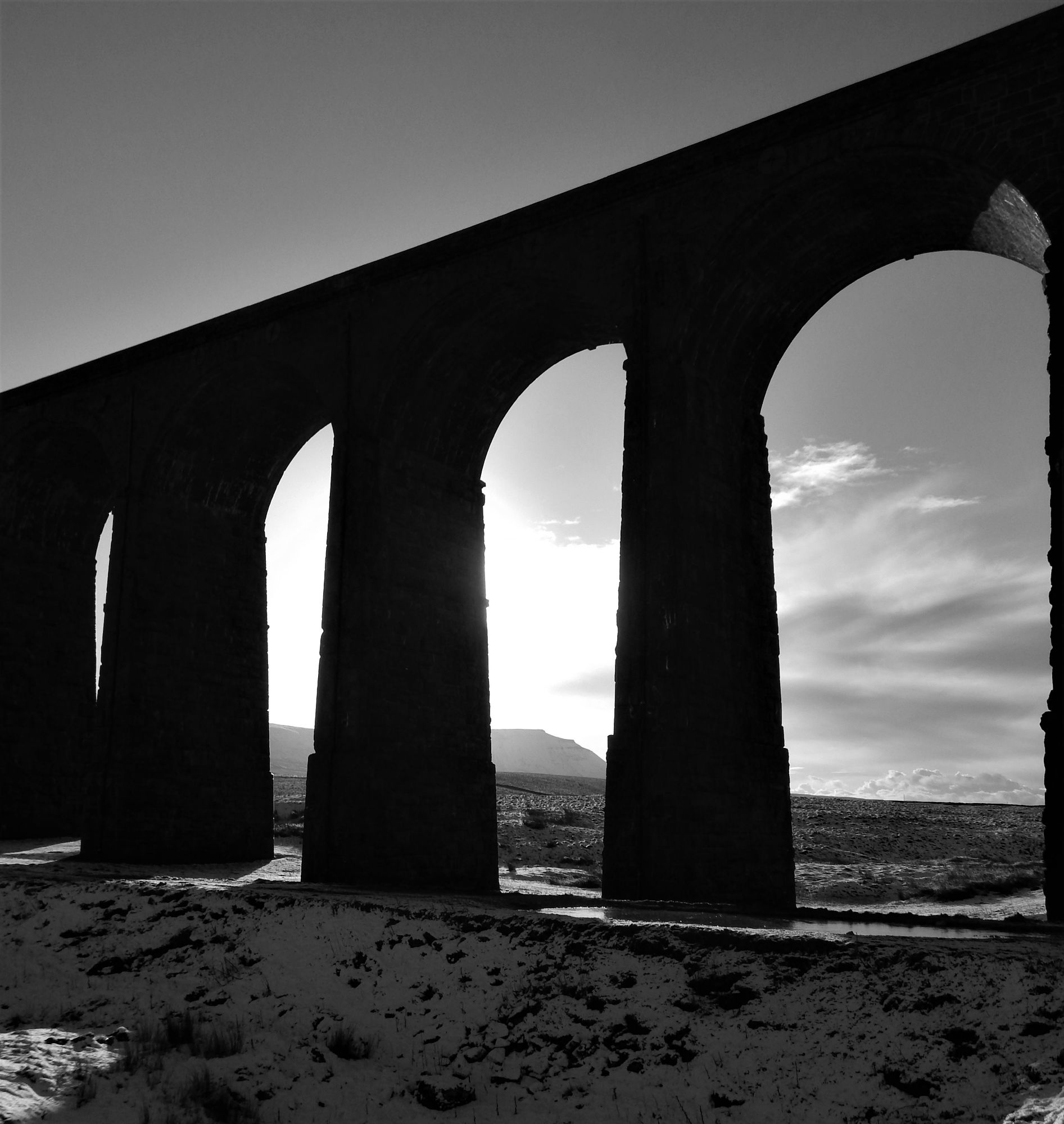 Ribblehead Viaduct and a glimpse of Ingleborough