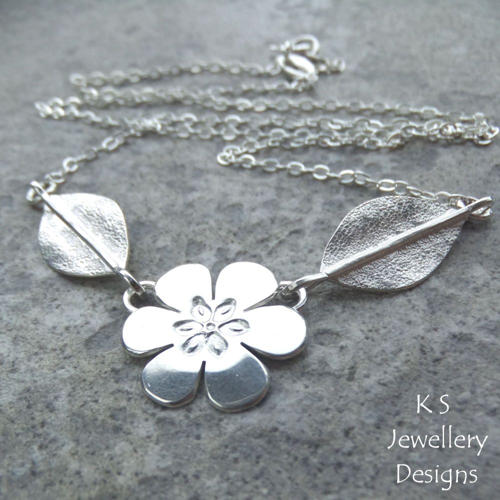 Six Petal Flower and Leaves Sterling Silver Necklace