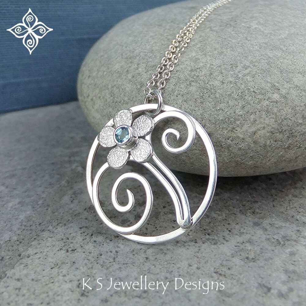 Swiss Blue Topaz Flower and Swirls Sterling Silver Circle Pendant